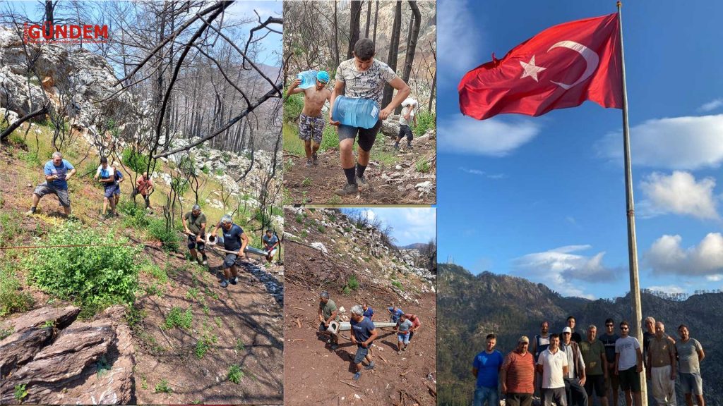Marmarisli vatandaşlar yanan tepeye Türk Bayrağı dikti
